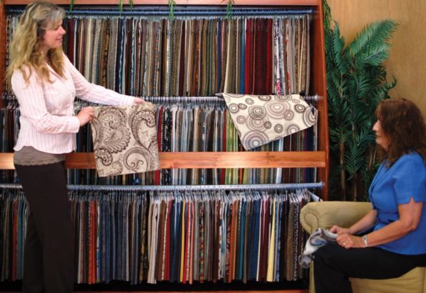 Hands on fabric comparison at Fireside Furniture. Feel the fabric.