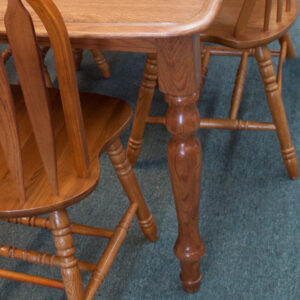 details of country dining set with arrowhead backed chairs