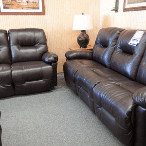 top grain reclining sofa and loveseat reclining and popping back up.